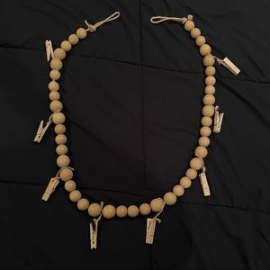 Wooden bead garland photo holder